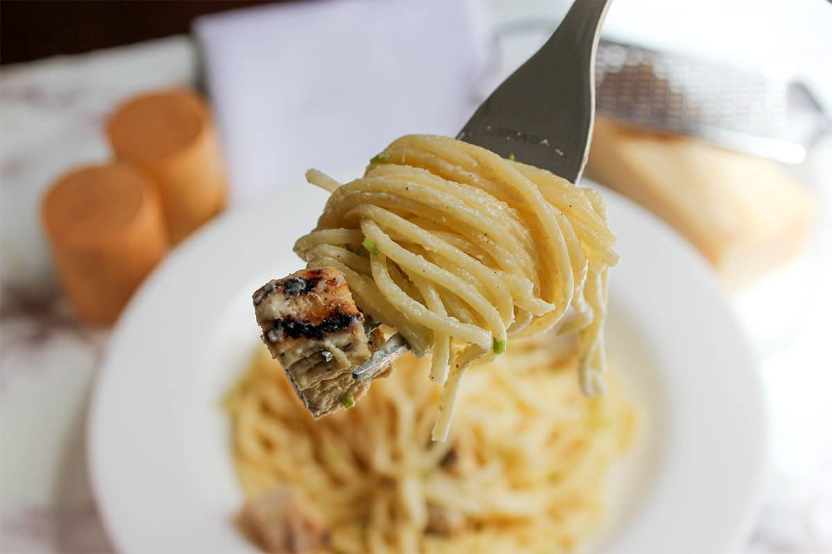 close up image of pasta on fork.
