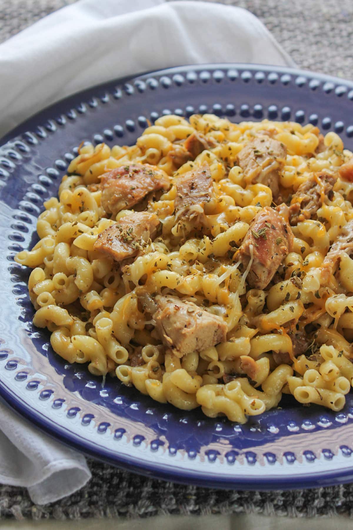 Tasty leftover chicken with pasta and melted cheese.