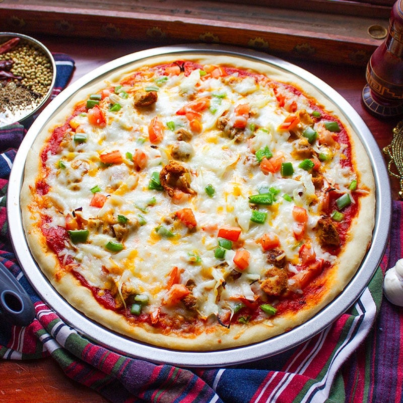 chicken tikka pizza feature 2026.