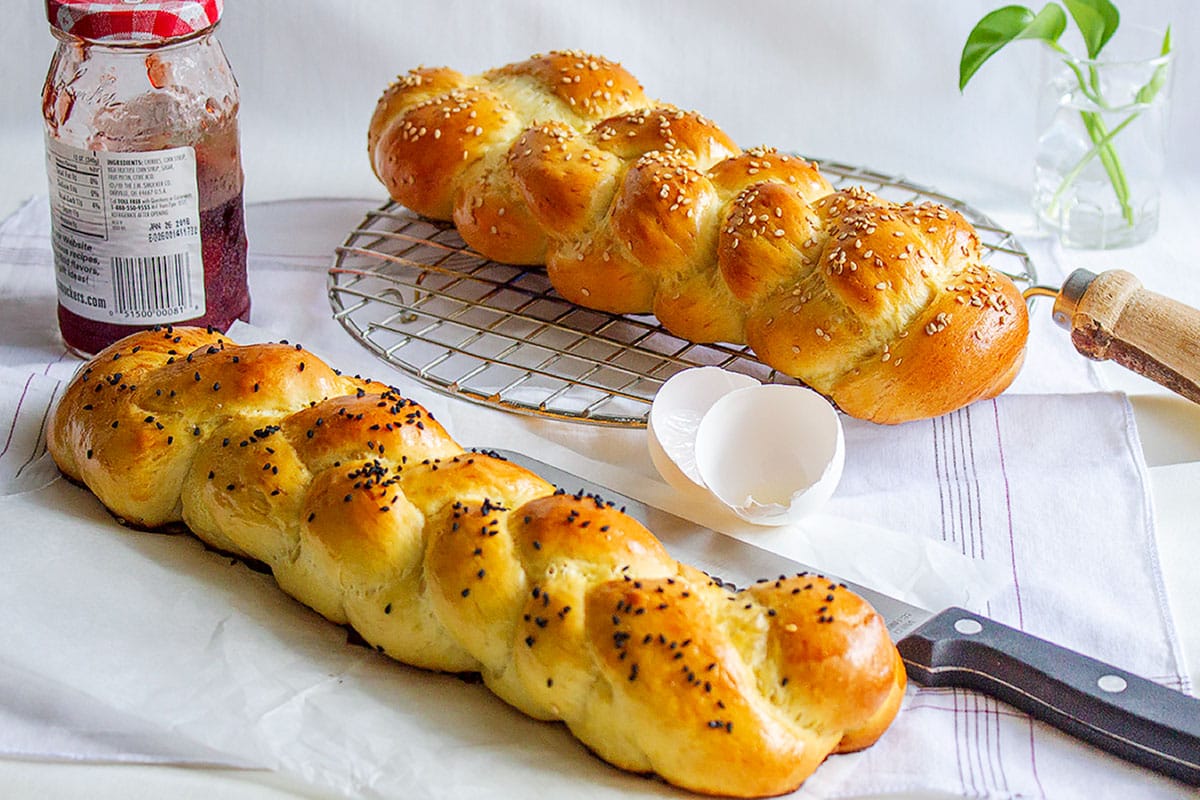 Two loaf of braided sweet milk bread.