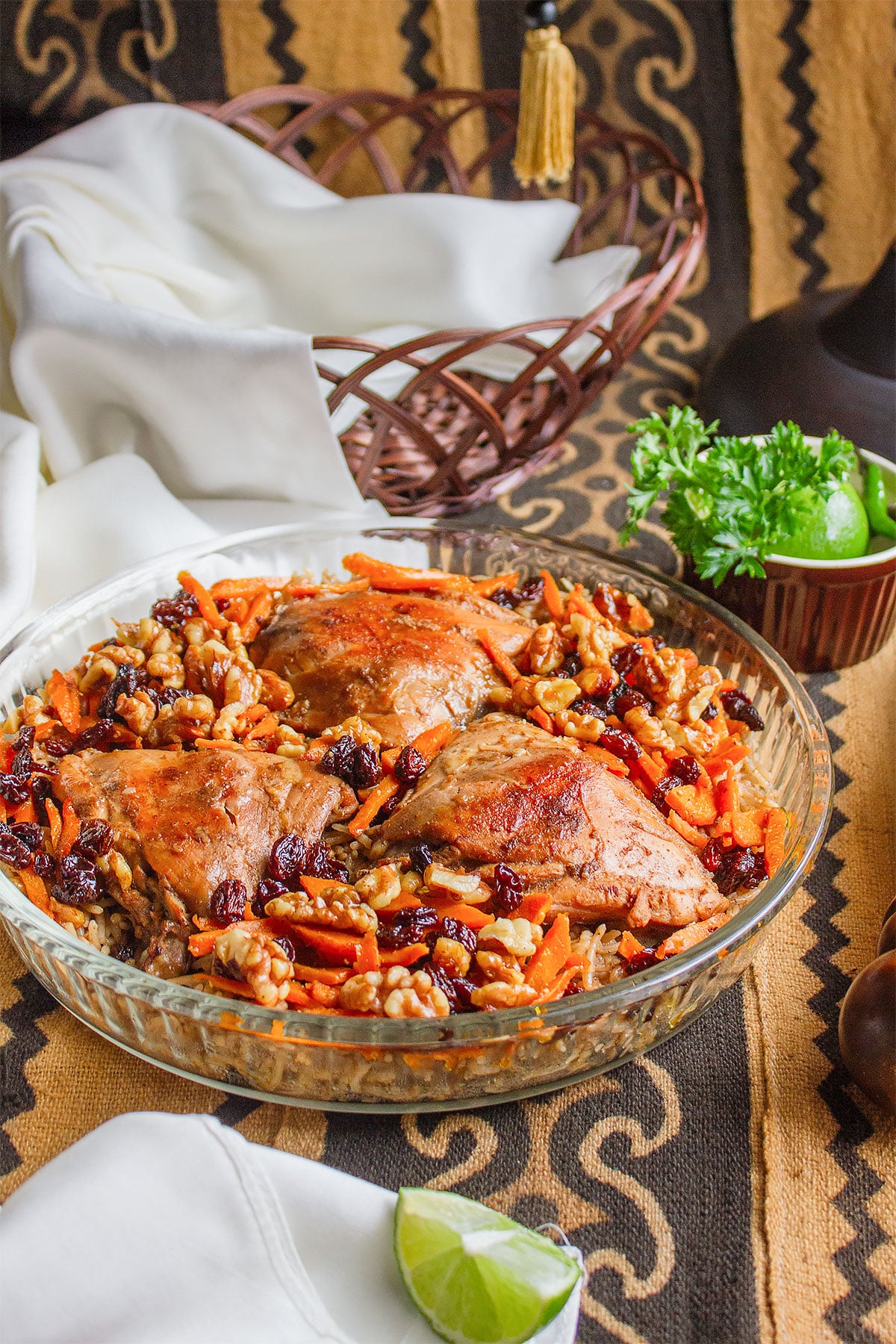 Juicy chicken thighs over fluffy Afghani rice, garnished with fried raisins and fried carrots and walnuts.