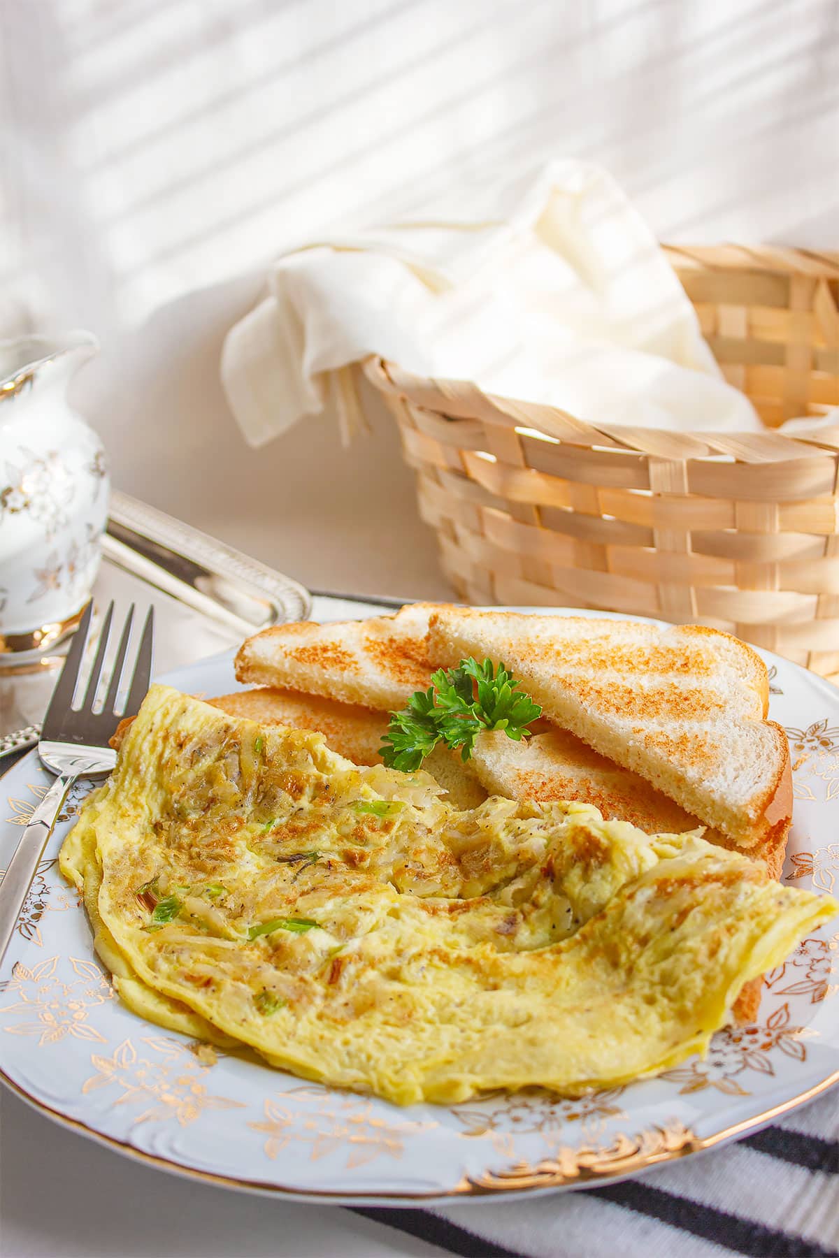 Freshly prepared potato omelet with toast on the side.