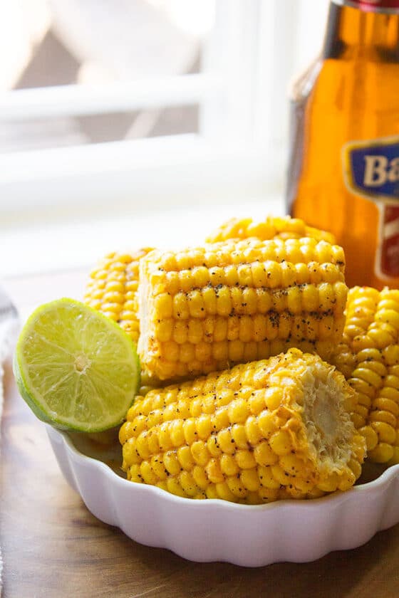 Corn on the cob. Cooking corn on the cob on stove top takes 5 minutes, and then brush it with butter and spice mixture while warm. This corn on the cob recipe will become your go-to recipe. Buttery, delicious, and tender, make some perfect corn on the cob today. www.munatycooking.com | @munatycooking