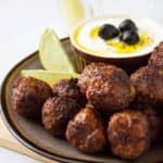 Greek Meatballs with Tzatziki Dip Recipe. Learn how to make juicy and flavorful Greek meatballs with ingredients available in your kitchen. Super easy dinner Idea, these meatballs are so delicious without any sauce or dip. www.munatycooking.com | @munatycooking