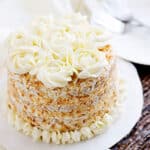 Coconut Cake recipe made from scratch with silky smooth buttercream frosting. My all-time favorite coconut cake recipe. Tender, delicious, moist coconut delight. Make it and let me know how you liked it. www.munatycooking.com | @munatycooking #coconutcake