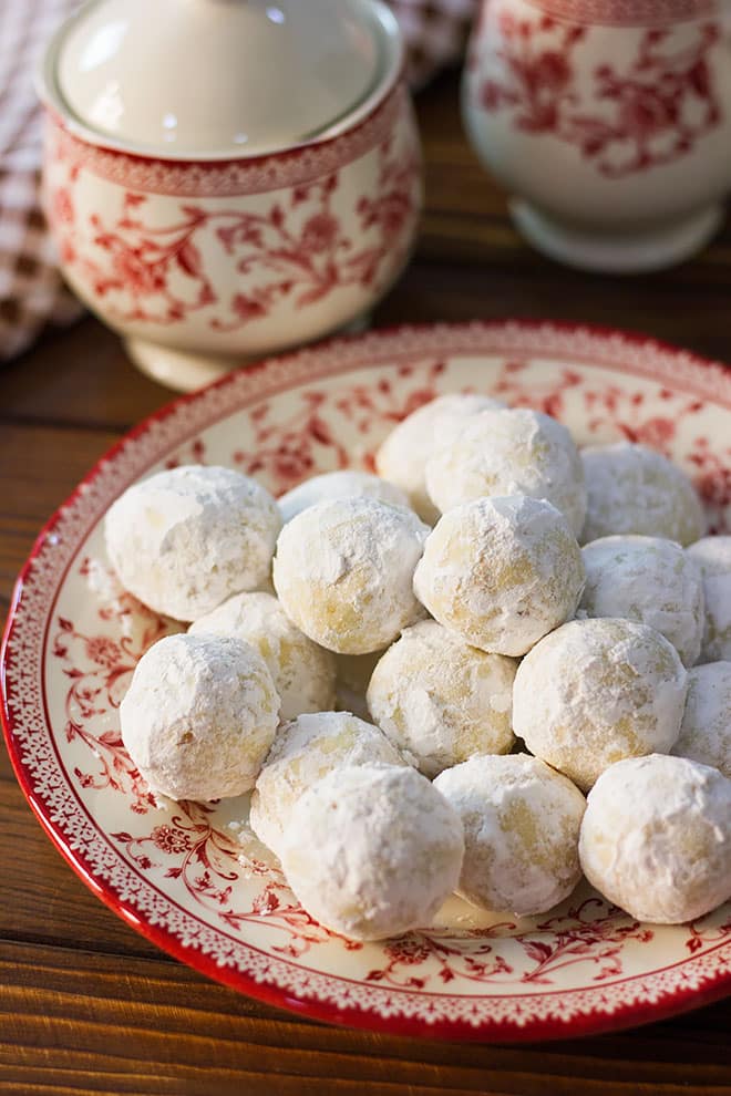 Russian tea cakes cookies in a plate.