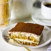 Egg free tiramisu served in a white plate 2024.