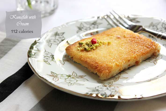 Freshly baked kunafa with cream.