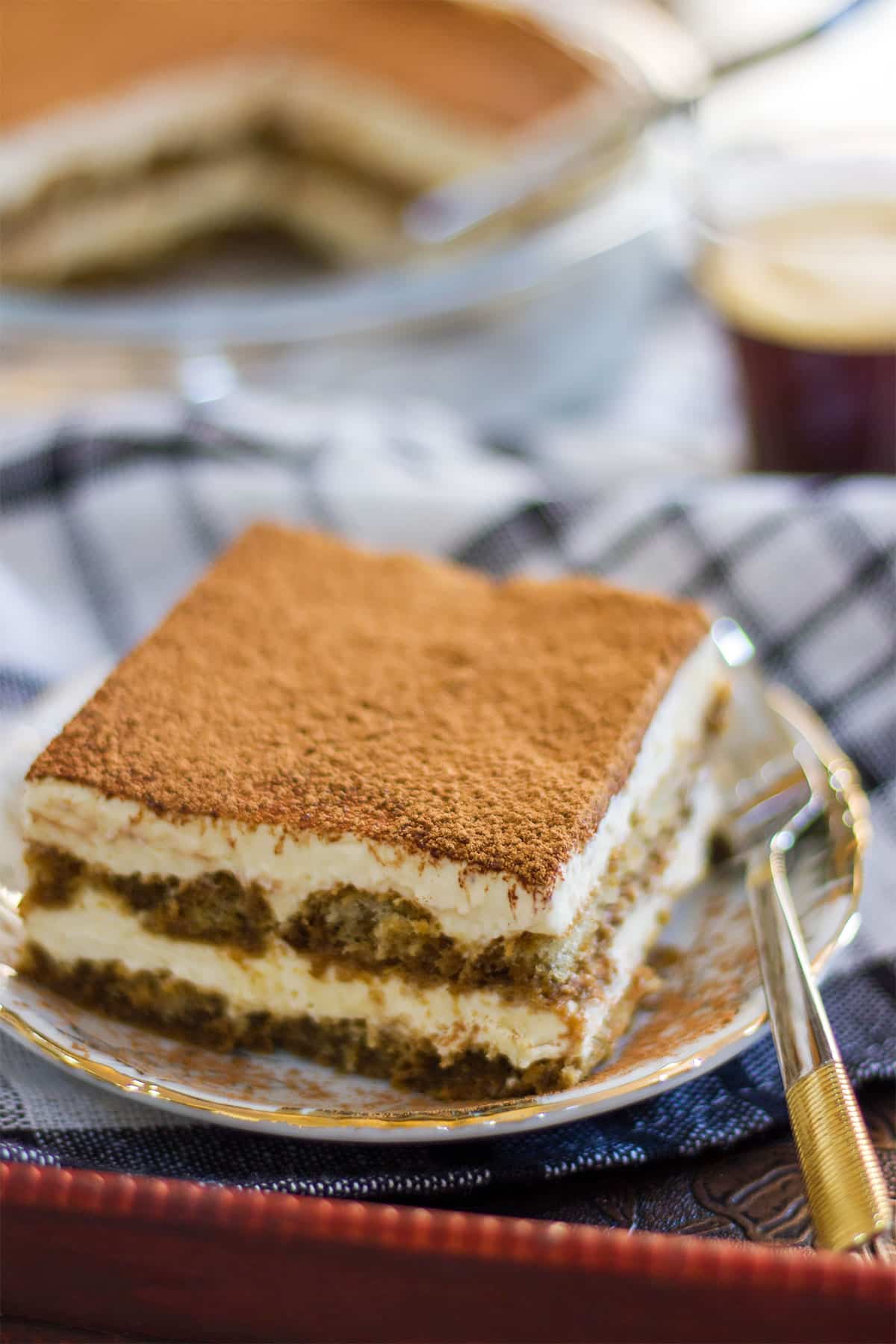 Alcohol free tiramisu slice served with a fork.