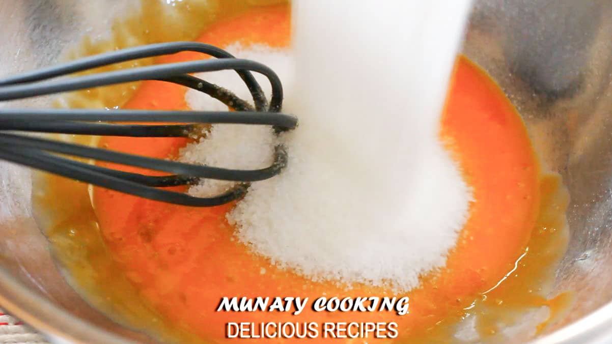 Beating egg yolks with sugar.