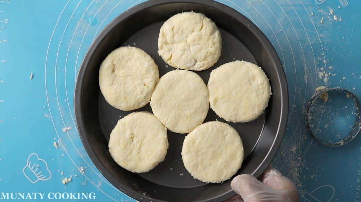 Shaped biscuits in a baking pan ready for baking.