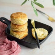 Stack of Southern biscuits on a black plate.