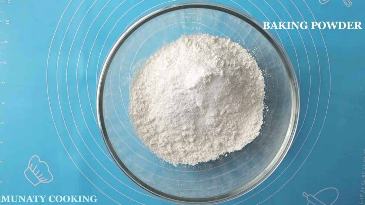 Mixing dry ingredients in a mixing bowl.