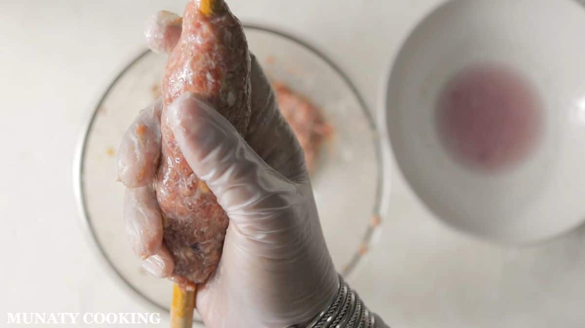 Shaping the kofta.