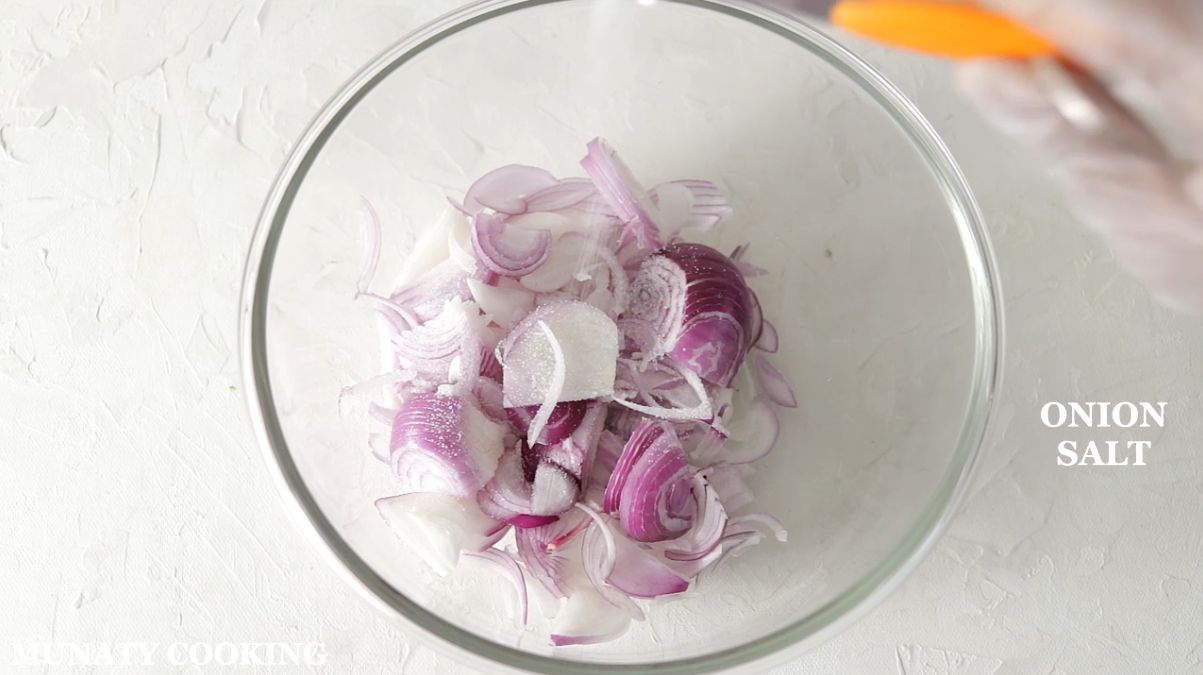Rubbing salt with onion.