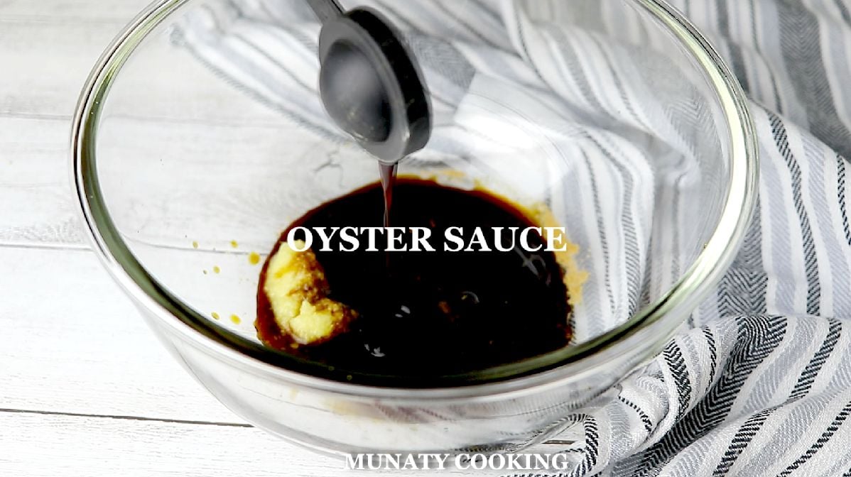 Mixing teriyaki chicken marinade in a bowl.