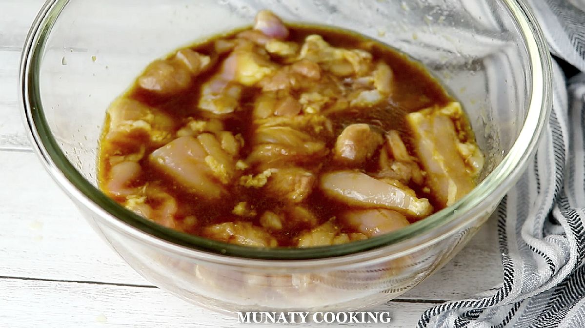 Marinating the chicken thighs in teriyaki sauce.
