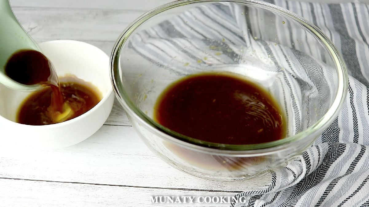Saving some of the marinade in a different bowl.