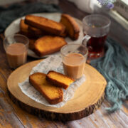 Cake rusk served with a glass of Indian Karak Chai.