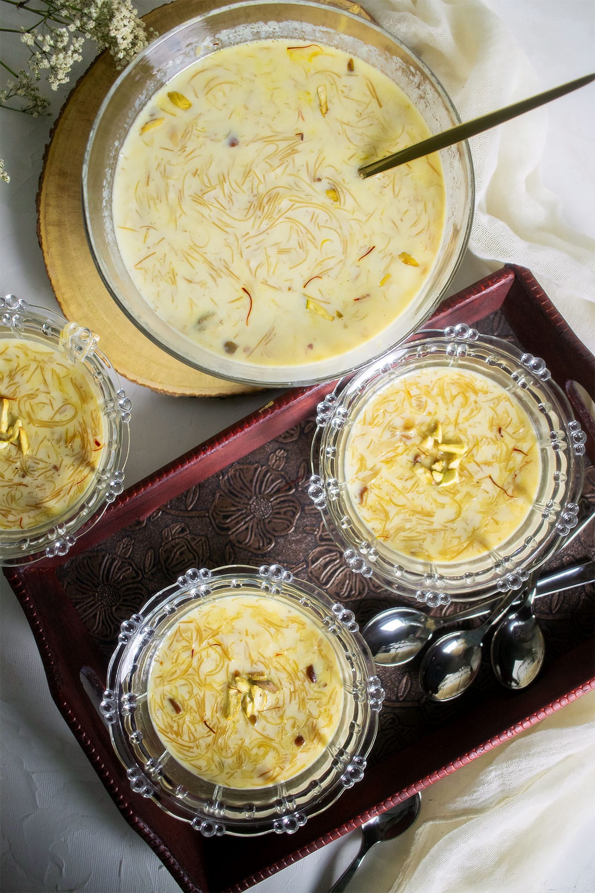Freshly prepared sheer khurma on a tray.
