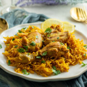 Chicken Kabsa served on a white plate.