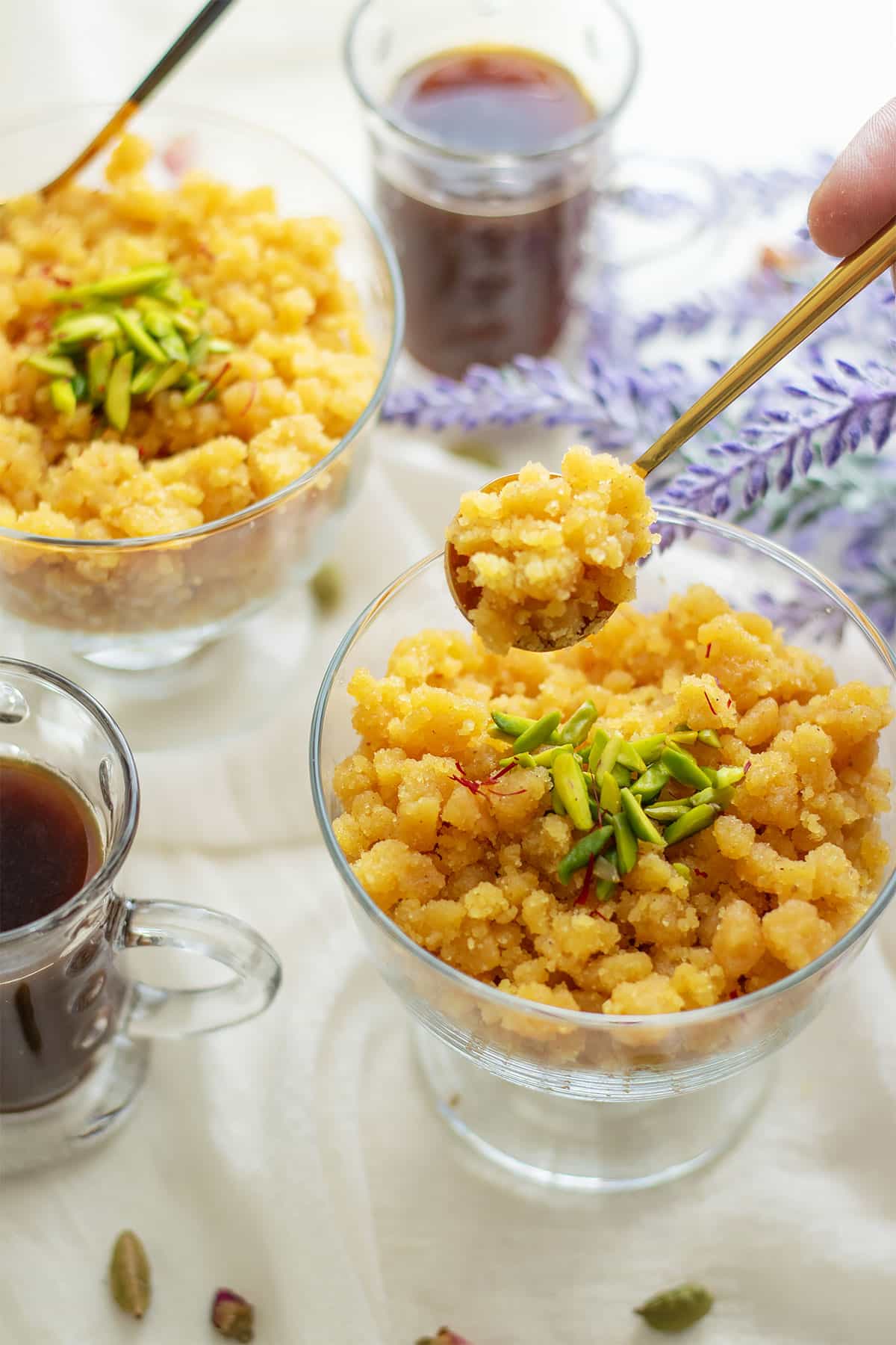 Showing semolina khabeesa in a spoon.