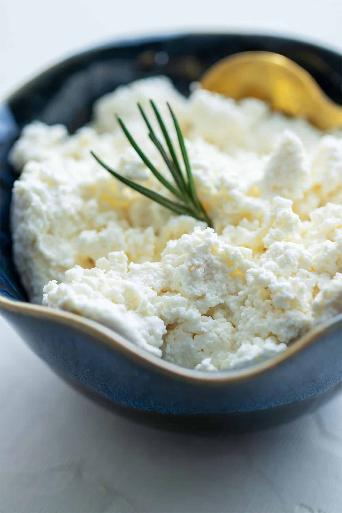 Close up image of ricotta cheese.