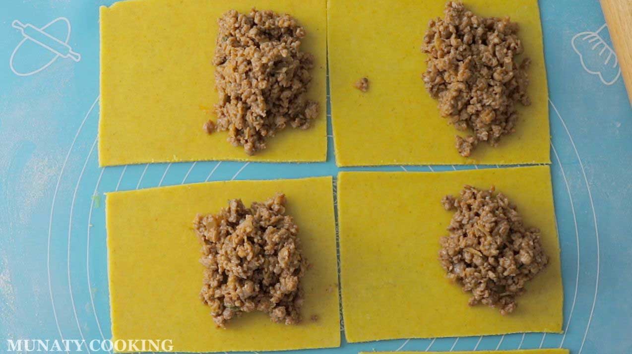 Filling the rolled out crust.