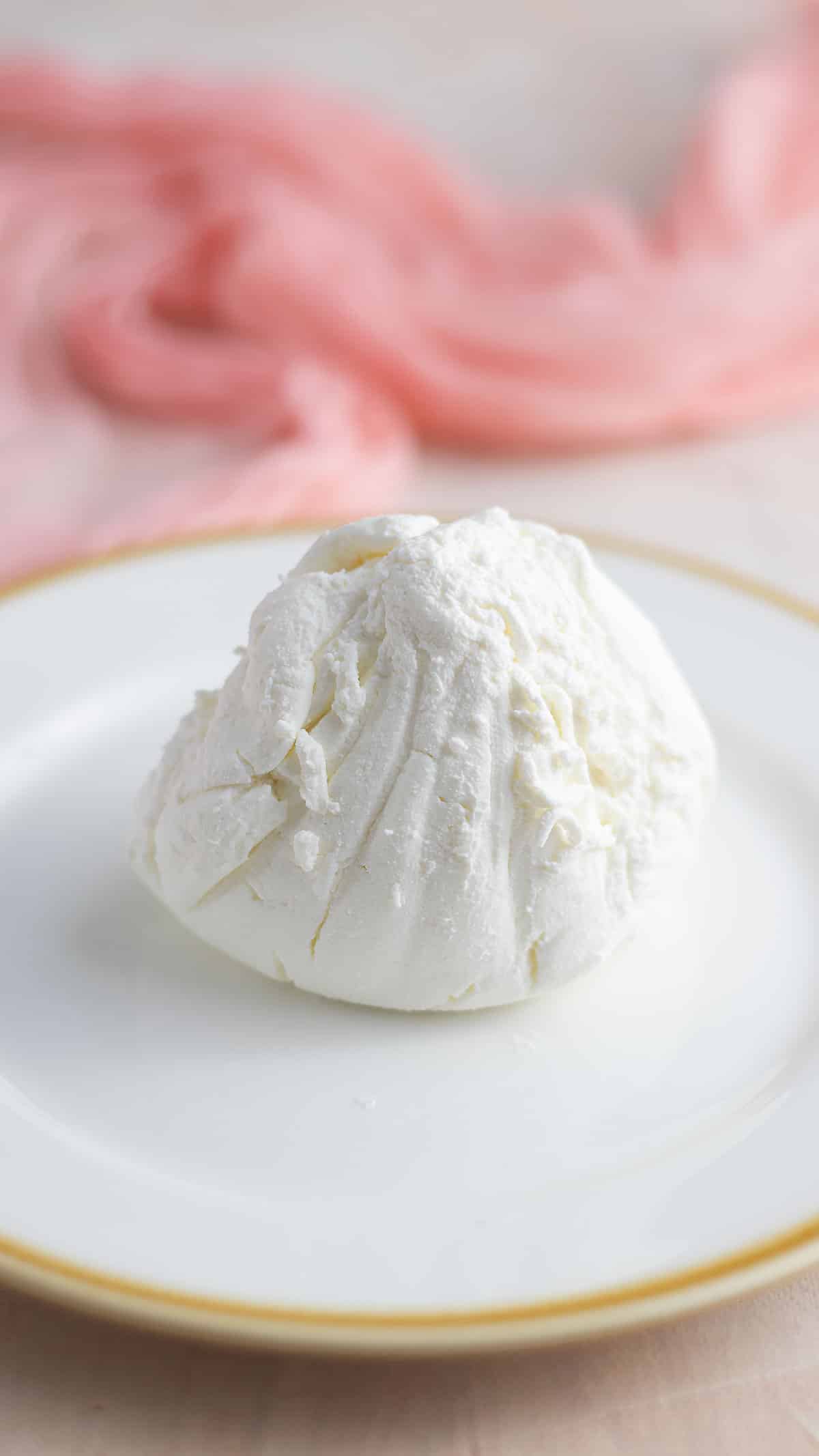 Labneh freshly out of the cheese cloth strainer before spreading it.