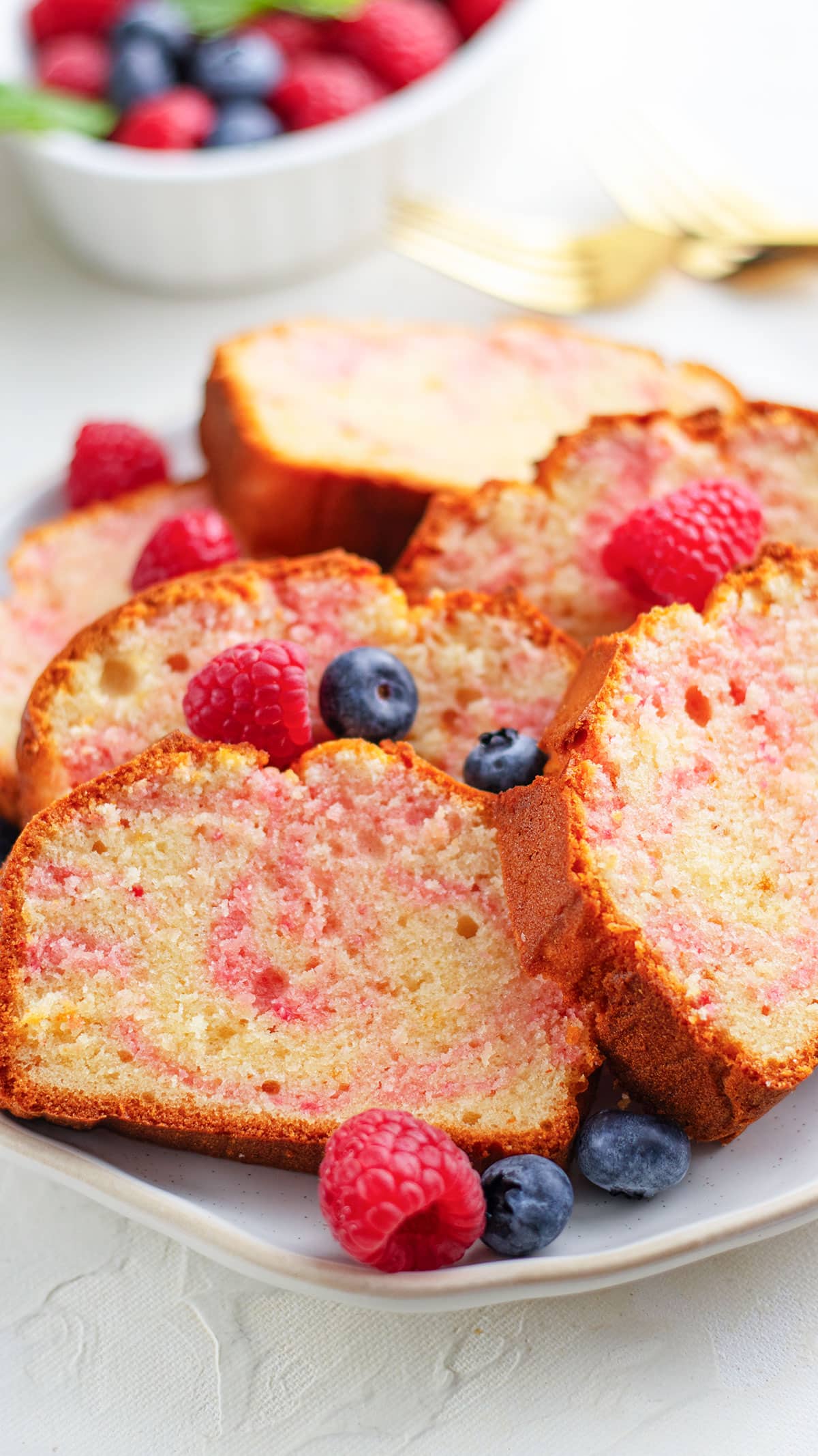 Showing tender crumbs of the raspberry swirl cake.